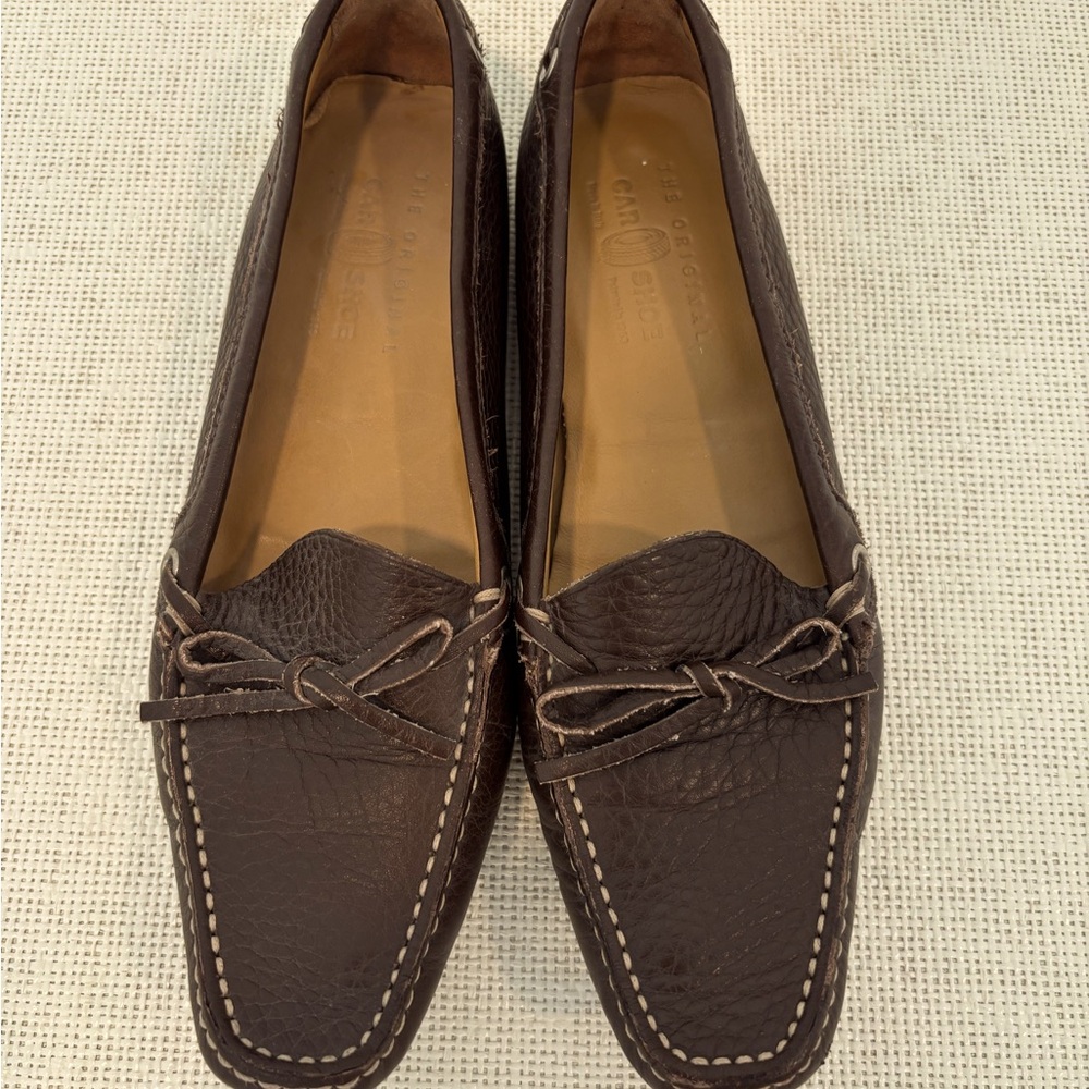 Women’s brown Car Shoe by Prada
36 but fits like a 36.5.